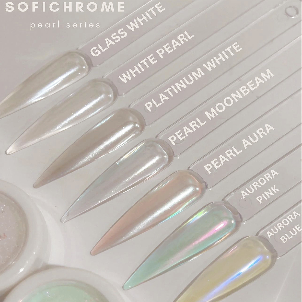 Sofi-Chrome High Brilliance Nail Powder Glass White - Elevate your classic mani with this simple yet stunning powder finish. Endless color opportunities! These shades will transform your mediocre mani to gorgeous insta worthy nails. Finely milled powder perfection.
