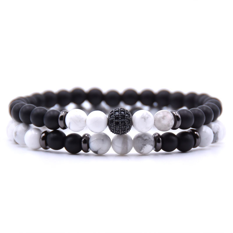 Handmade - Natural Stone - Black Onyx Beaded Bracelets 6 mm - Each stone is hand selected to ensure a high quality piece of jewelry. Black Onyx crystals can be used used for grounding, protection and self control which shield us against negative energy. White Howlite is a stone of infinite patience. It can help bring new ideas into focus and aids in achieving ambitions and dreams.