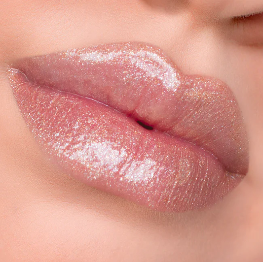 Clear gloss, gold glitter. Glossy Finish. Plant-Based. Vegan. Animal Cruelty-Free. Vitamin E Enriched - Moisturizing. Ultra-Lightweight - Non-Stick Formula. ella+mila Liquid Lipstick - Get The Glow