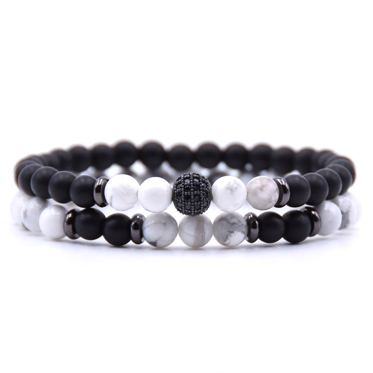 Handmade - Natural Stone - Black Onyx Beaded Bracelets 6 mm - Each stone is hand selected to ensure a high quality piece of jewelry. Black Onyx crystals can be used used for grounding, protection and self control which shield us against negative energy. White Howlite is a stone of infinite patience. It can help bring new ideas into focus and aids in achieving ambitions and dreams.