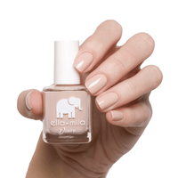 Light neutral nude. Vegan. Animal Cruelty-Free. Quick Dry. Chip Resistant. ella+mila Desire Collection Nail Polish - Light To The Touch