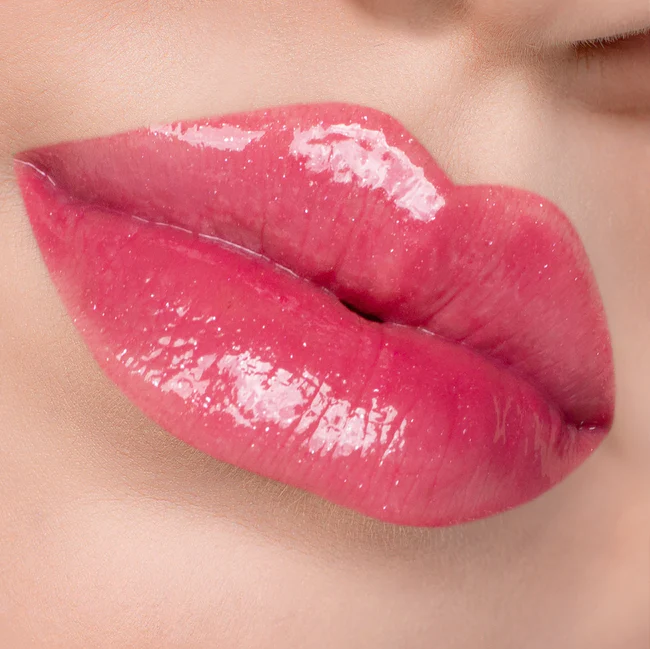 Pink tint with shimmer. Glossy Finish. Plant-Based. Vegan. Animal Cruelty-Free. Vitamin E Enriched - Moisturizing. Ultra-Lightweight - Non-Stick Formula. ella+mila Liquid Lipstick - Just Cheeky