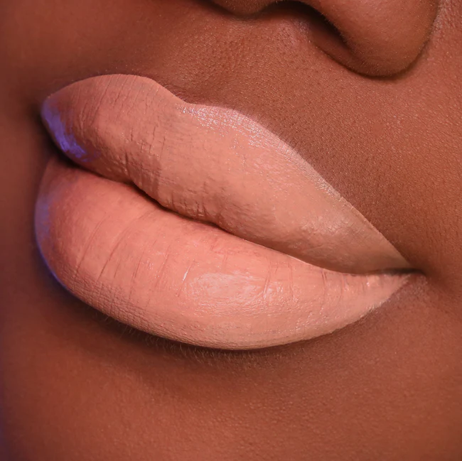 Neutral nude light brown. Creamy Lips. Plant-Based. Vegan. Animal Cruelty-Free. Vitamin E Enriched - Moisturizing. Ultra-Lightweight - Non-Stick Formula. ella+mila Liquid Lipstick - Spice Spice Baby
