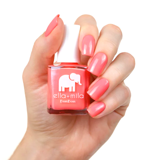 Bright peachy pink. Vegan. Animal Cruelty-Free. Quick Dry. Chip Resistant. ella+mila BonBon Collection Nail Polish - Sugar Rush